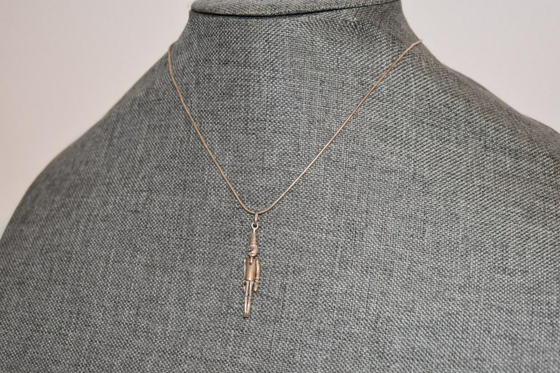 Vintage Sterling Silver Tin Man Pinocchio Pendant necklace 24": Vintage Sterling Silver Tin Man Pinocchio Pendant necklace 24" Please view all photos as they are part of the description and condition of this Item, Feel free to contact me with questions or picture 