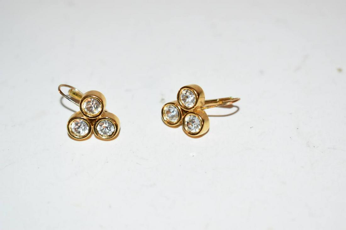 Givenchy Signed Earrings Gold Shiny Rhinestone Crystal clip on: Givenchy Signed Earrings Gold Shiny Rhinestone Crystal clip on Please view all photos as they are part of the description and condition of this Item, Feel free to contact me with questions or picture