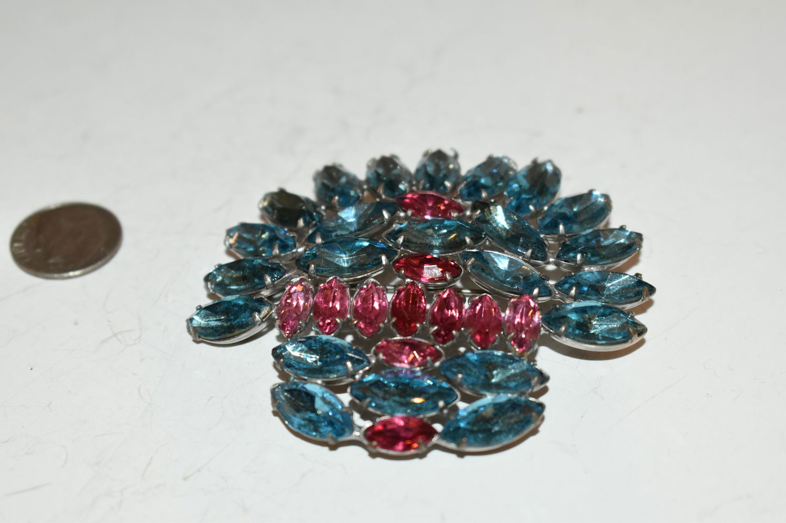 large vintage rhinestone blue pink brooch floral old: large vintage rhinestone blue pink brooch floral old Please view all photos as they are part of the description and condition of this Item, Feel free to contact me with questions or picture requests!