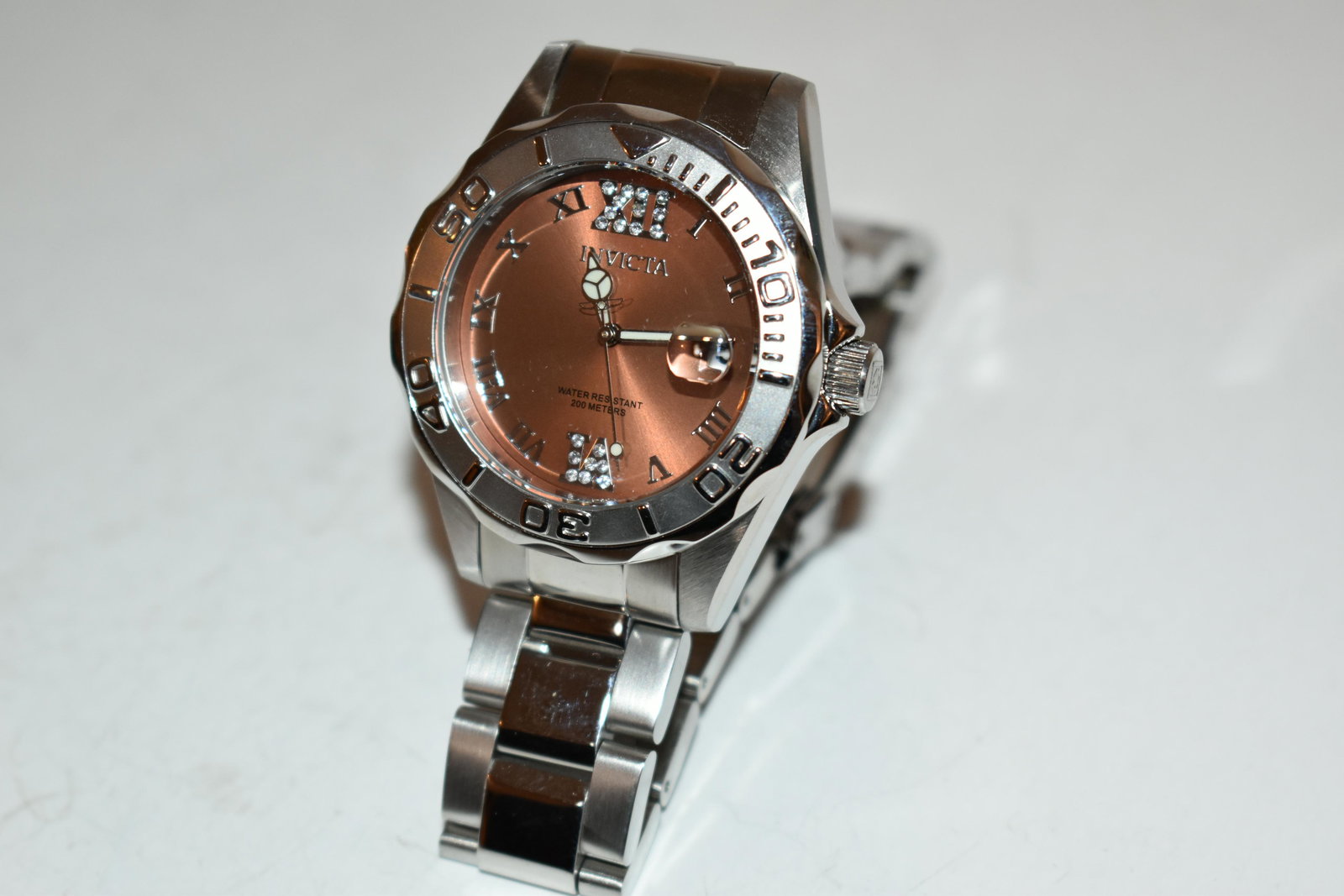 invicta watch women works great: invicta watch women works great Please view all photos as they are part of the description and condition of this Item, Feel free to contact me with questions or picture requests! Used Item AS IS