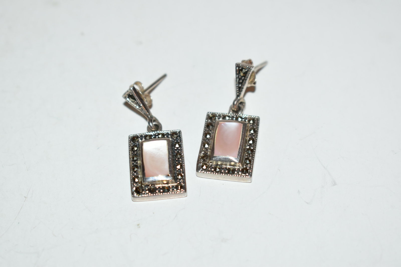 Vintage Sterling Silver pink mother of pearl marcasite Pierced Earrings: Vintage Sterling Silver pink mother of pearl marcasite Pierced Earrings Please view all photos as they are part of the description and condition of this Item, Feel free to contact me with questions or