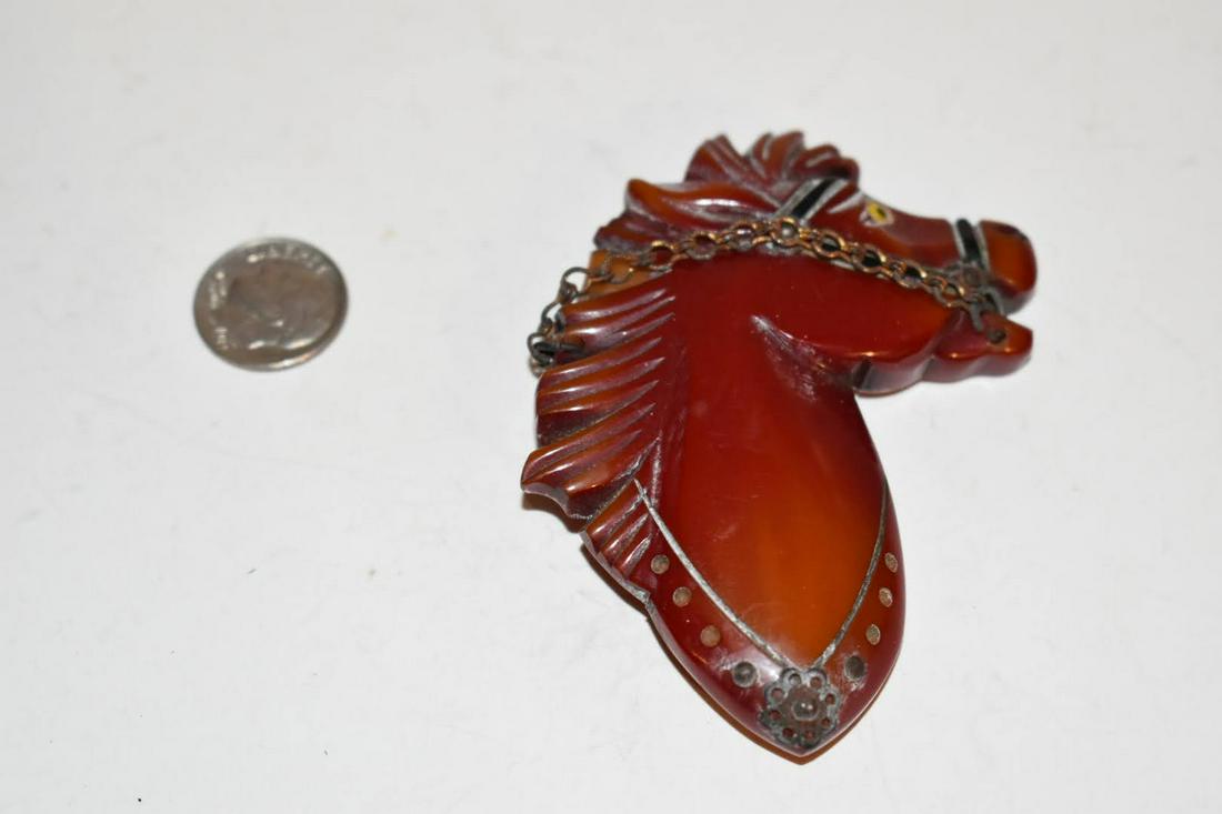 Antique c. 1930's Art Deco Carved Bakelite Horse Head Pin Brooch 3" has a broken pc: Antique c. 1930's Art Deco Carved Bakelite Horse Head Pin Brooch 3" has a broken pc Please view all photos as they are part of the description and condition of this Item, Feel free to contact me with