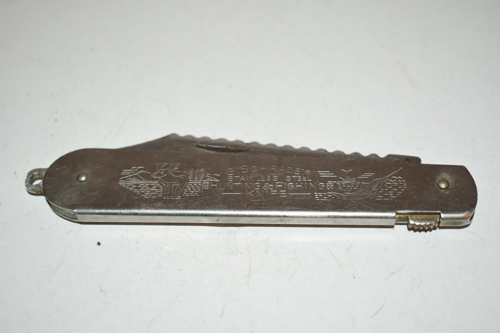 Vintage Stainless G. Schrade's Hunting & Fishing Folding Pocket Knife: Vintage Stainless G. Schrade's Hunting & Fishing Folding Pocket Knife Please view all photos as they are part of the description and condition of this Item, Feel free to contact me with questions or p