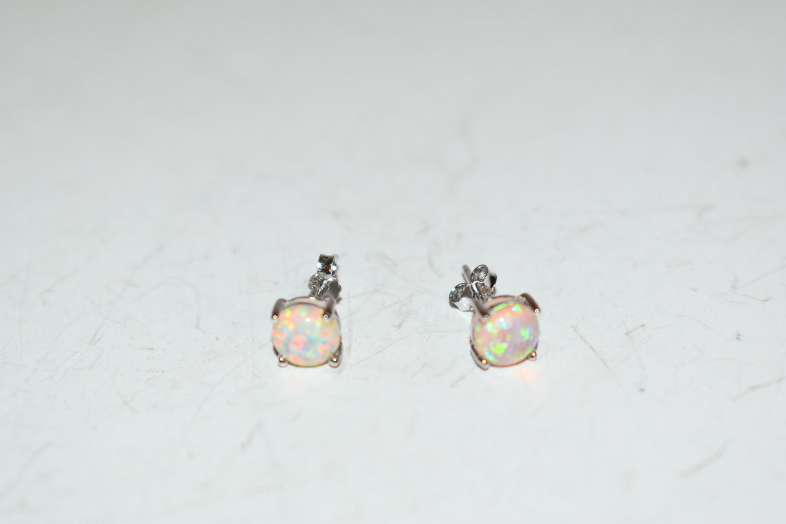 Vintage Sterling silver pink Opal post Earrings: Vintage Sterling silver pink Opal post Earrings Please view all photos as they are part of the description and condition of this Item, Feel free to contact me with questions or picture requests! Used