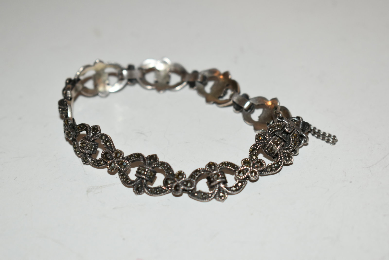Sterling Silver Onyx & Marcasite Link Bracelet 7": Sterling Silver Onyx & Marcasite Link Bracelet 7" Please view all photos as they are part of the description and condition of this Item, Feel free to contact me with questions or picture requests! Use