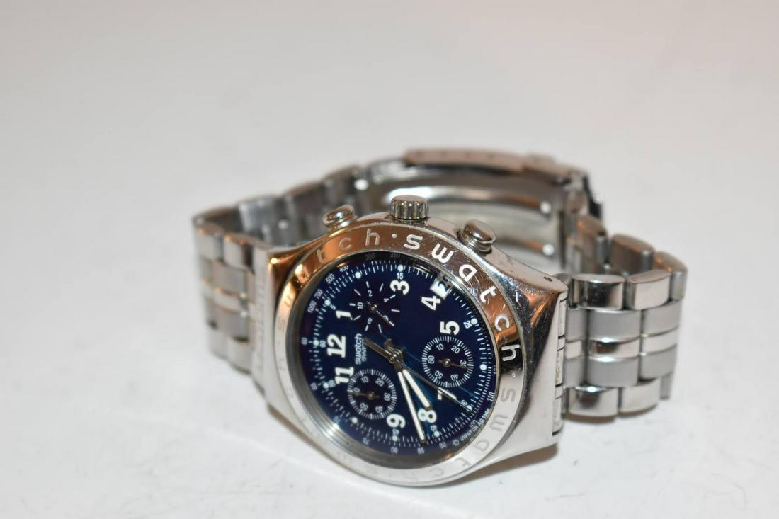 vintage mens chrono swatch watch works great!!: vintage mens chrono swatch watch works great!! Please view all photos as they are part of the description and condition of this Item, Feel free to contact me with questions or picture requests! Used I