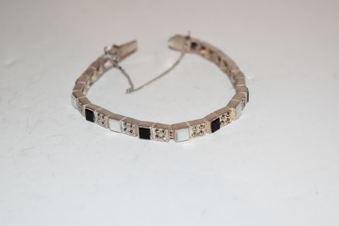 Vintage sterling silver onyx mother of pearl marcasite bracelet 7": Vintage sterling silver onyx mother of pearl marcasite bracelet 7" Please view all photos as they are part of the description and condition of this Item, Feel free to contact me with questions or pict