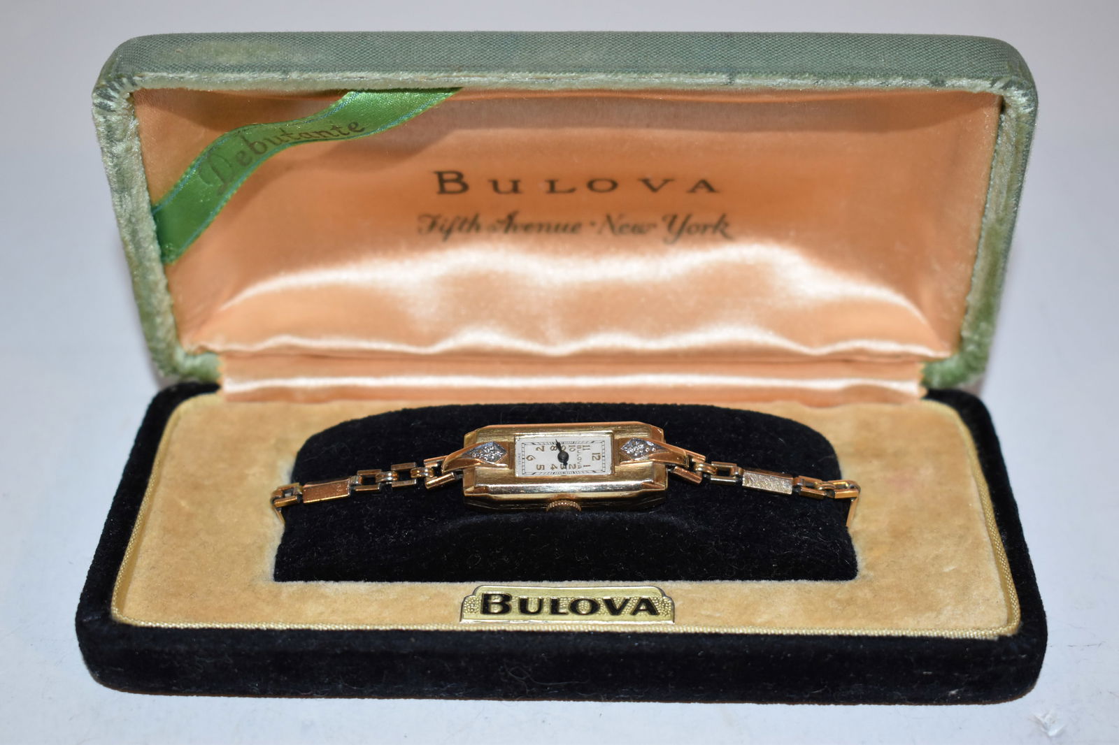 Vintage Lady Bulova 10k Gold GF & Diamonds Art Deco Cocktail Dress Watch 1934 works great!!! With: Vintage Lady Bulova 10k Gold GF & Diamonds Art Deco Cocktail Dress Watch 1934 works great!!! With box Please view all photos as they are part of the description and condition of this Item, Feel free t
