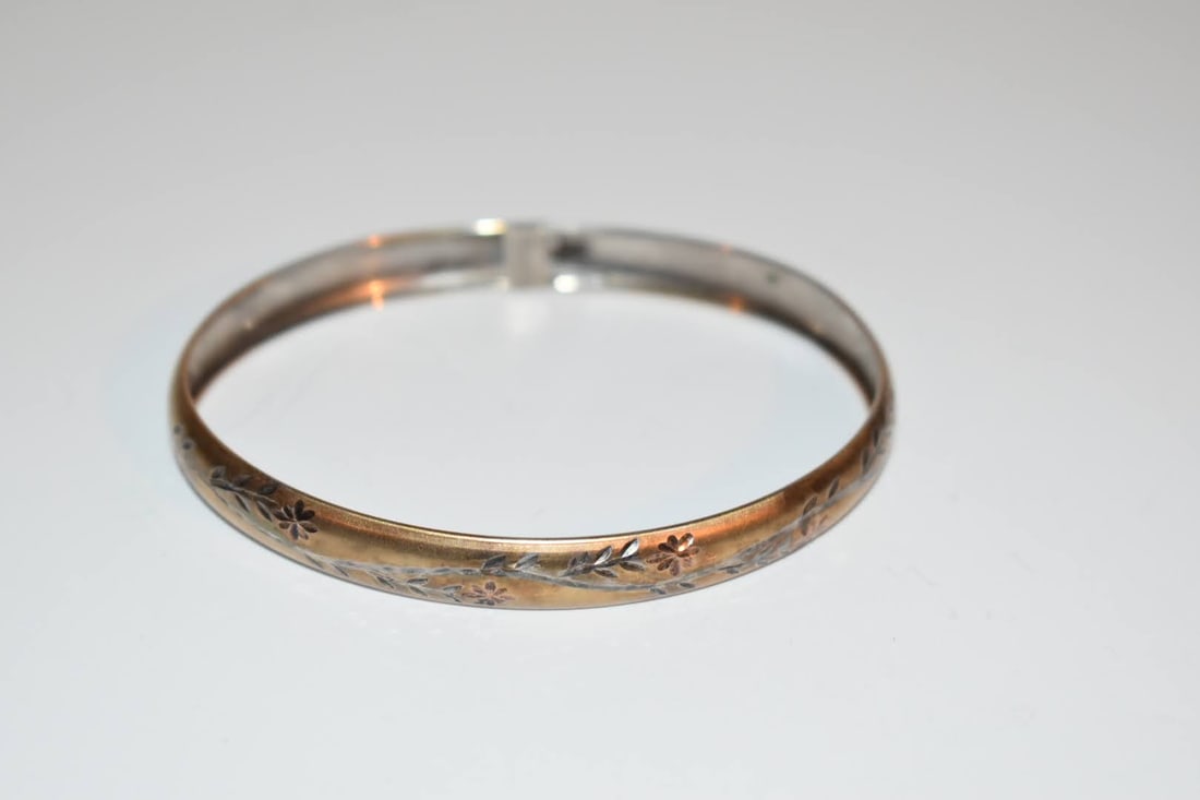 vintage sterling silver 10K twist bracelet 8": vintage sterling silver 10K twist bracelet 8" Please view all photos as they are part of the description and condition of this Item, Feel free to contact me with questions or picture requests! Used It