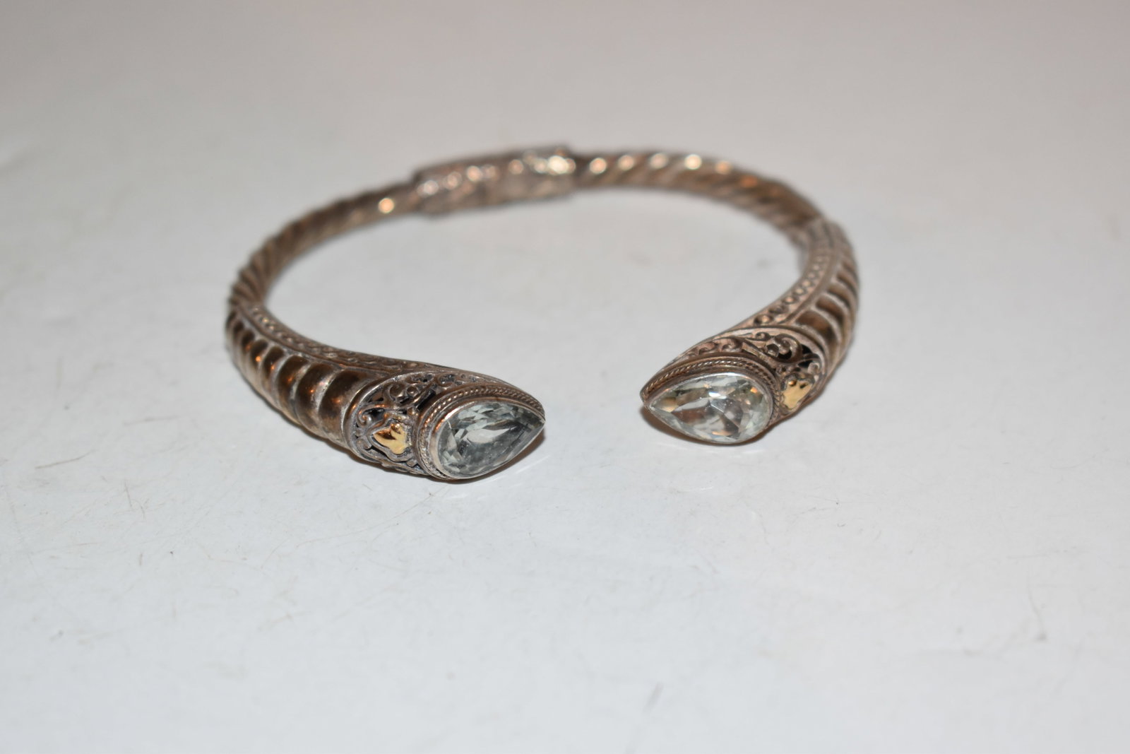 Vintage Tanzanite Sterling Silver 18K Gold Cuff Bracelet 7": Vintage Tanzanite Sterling Silver 18K Gold Cuff Bracelet 7" Please view all photos as they are part of the description and condition of this Item, Feel free to contact me with questions or picture req