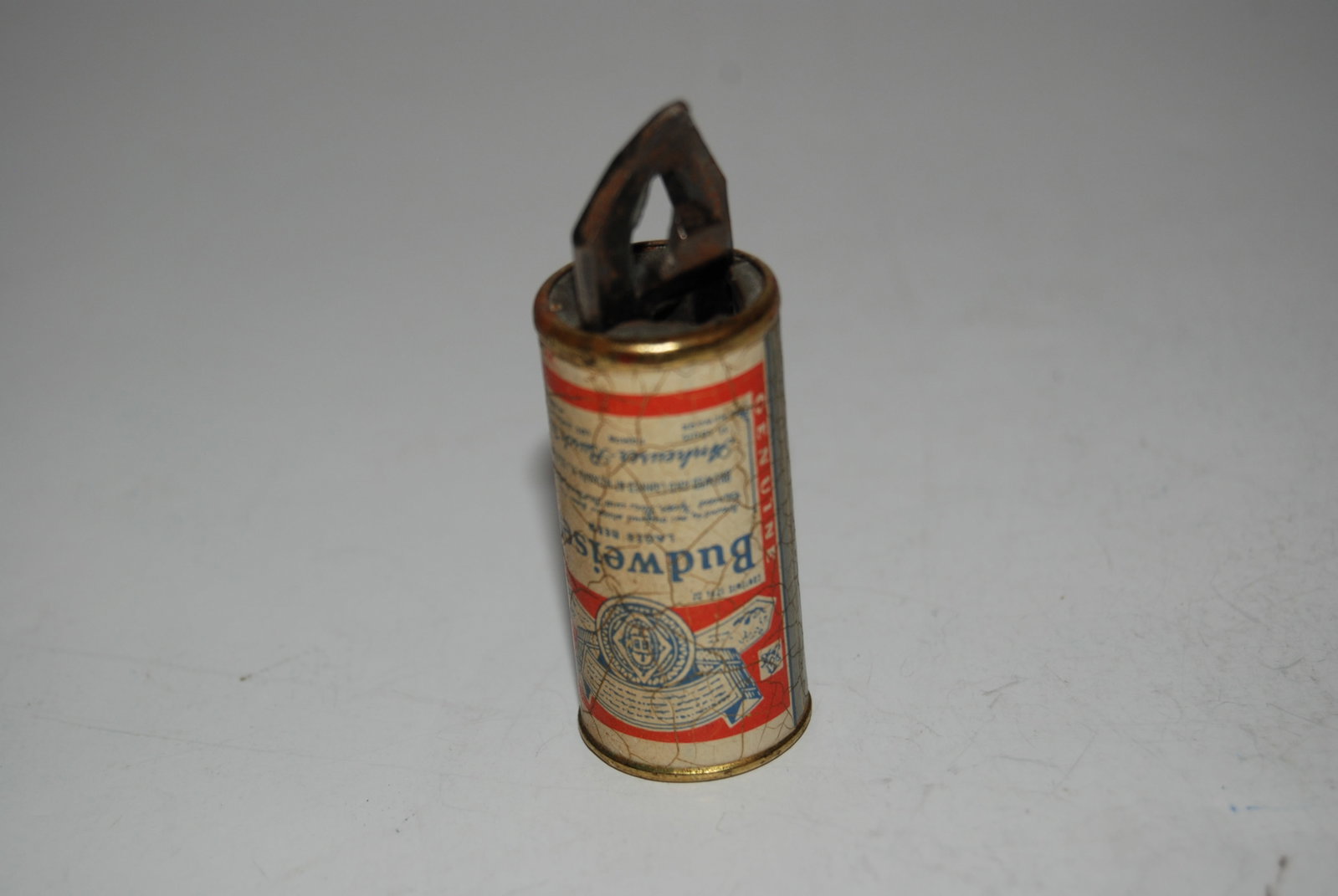 Vintage Budwieser beer can opener: Vintage Budwieser beer can opener Please view all photos as they are part of the description and condition of this Item, Feel free to contact me with questions or picture requests! Used Item AS IS