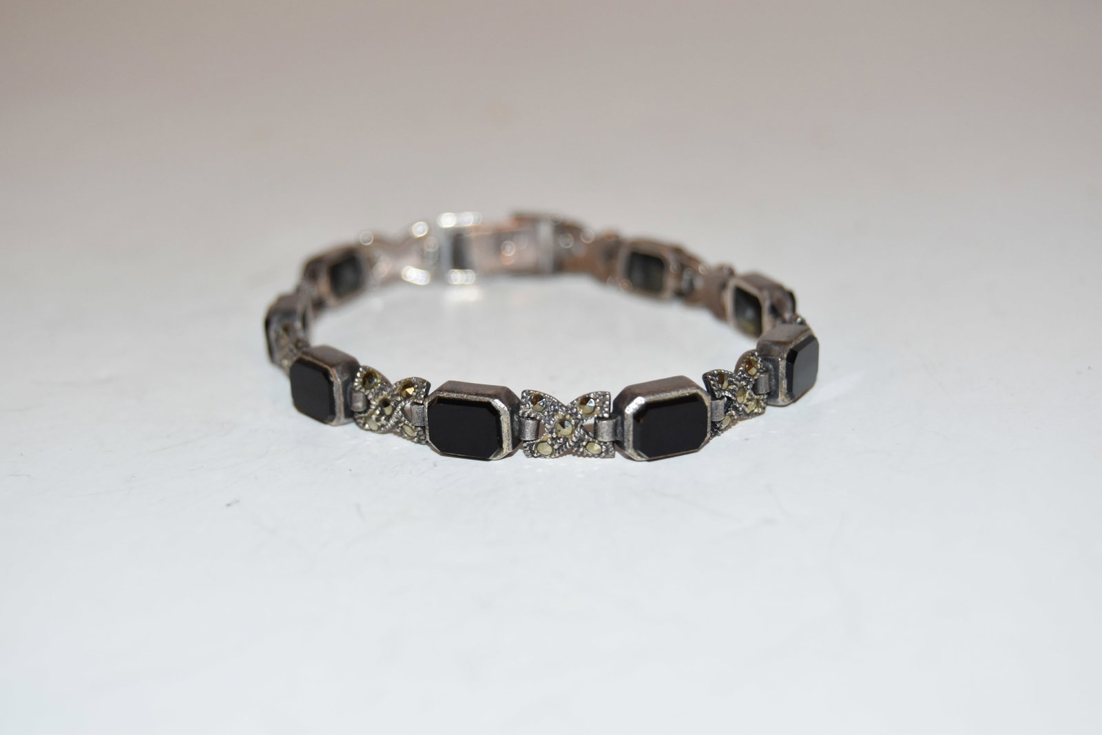 Vintage Sterling Silver onyx marcasite tennis Bracelet 7": Vintage Sterling Silver onyx marcasite tennis Bracelet 7" Please view all photos as they are part of the description and condition of this Item, Feel free to contact me with questions or picture reque
