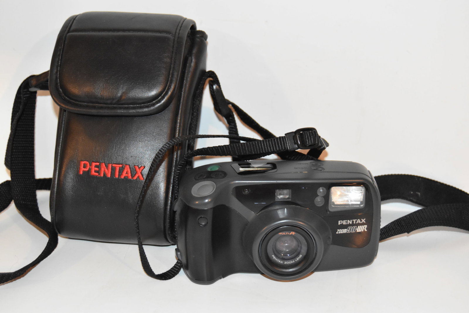 Pentax Zoom 90-WR Point and Shoot Water Resistant Camera 35mm Film Tested Case: Pentax Zoom 90-WR Point and Shoot Water Resistant Camera 35mm Film Tested Case Please view all photos as they are part of the description and condition of this Item, Feel free to contact me with quest