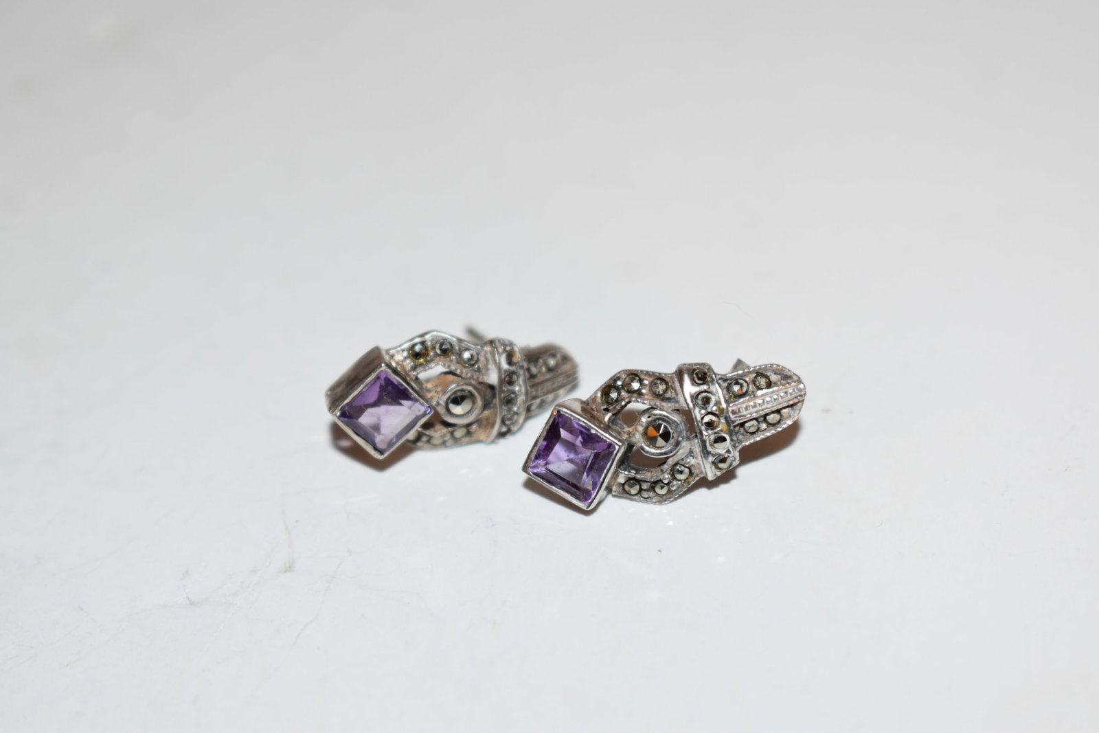 Vintage sterling silver Amethyst marcasite post earrings: Vintage sterling silver Amethyst marcasite post earrings Please view all photos as they are part of the description and condition of this Item, Feel free to contact me with questions or picture reques
