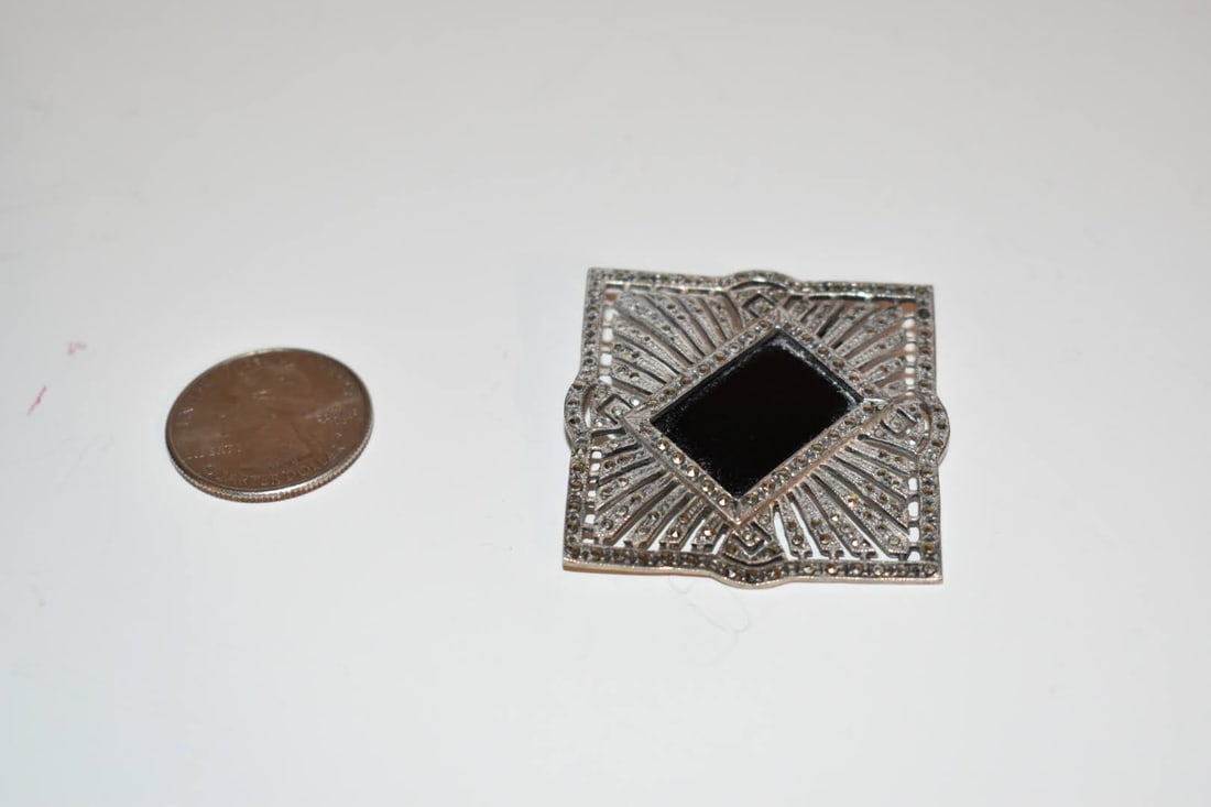 Vintage JJ sterling silver Marcasite brooch: Vintage JJ sterling silver Marcasite brooch Please view all photos as they are part of the description and condition of this Item, Feel free to contact me with questions or picture requests! Used Item