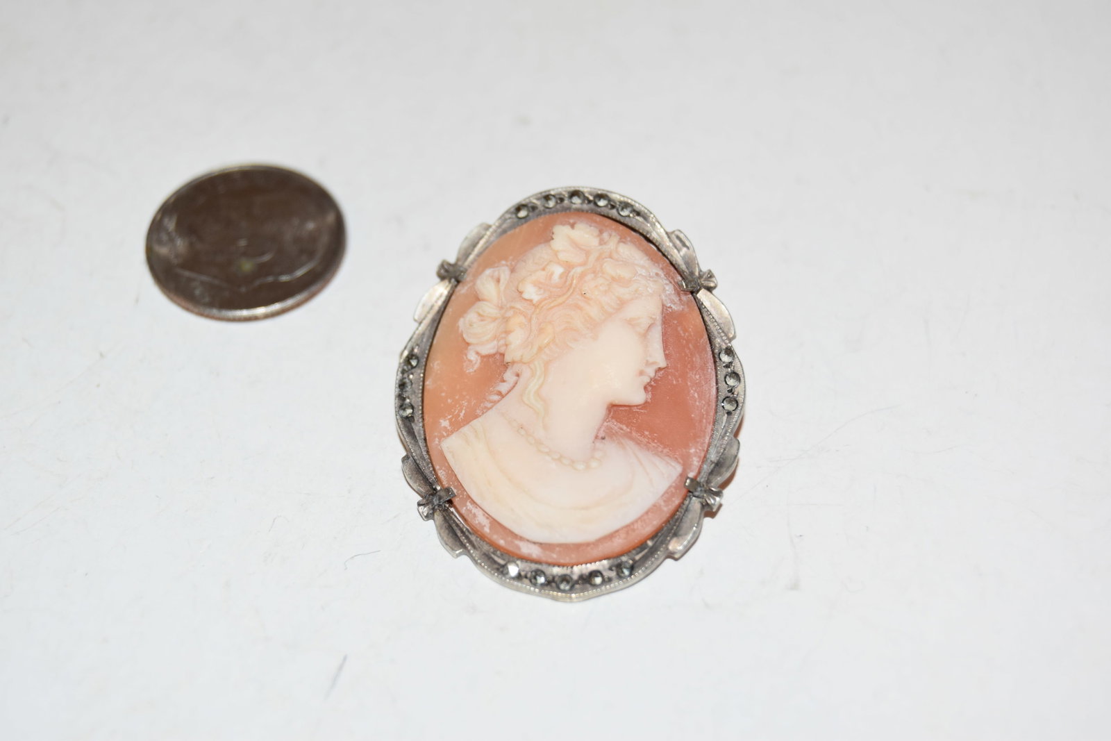 Vintage Sterling Silver cameo marcasite Brooch 1 1/2": Vintage Sterling Silver cameo marcasite Brooch 1 1/2" Please view all photos as they are part of the description and condition of this Item, Feel free to contact me with questions or picture requests!