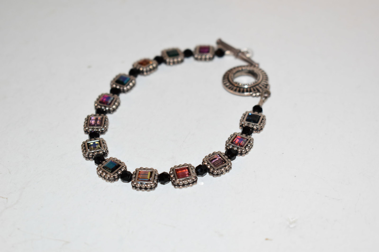 Vintage sterling silver colorful stone bracelet 8": Vintage sterling silver colorful stone bracelet 8" Please view all photos as they are part of the description and condition of this Item, Feel free to contact me with questions or picture requests! Us