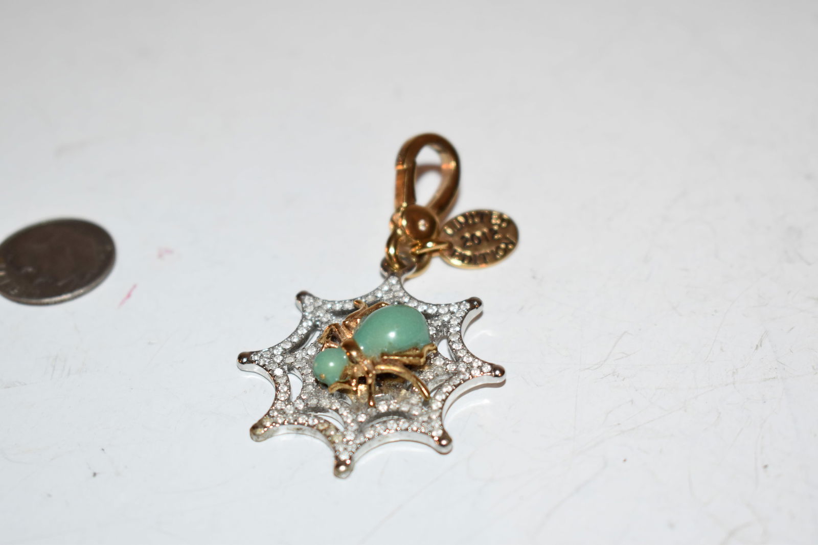 2012 Juicy Couture Limited Edition Spider Charm: 2012 Juicy Couture Limited Edition Spider Charm Please view all photos as they are part of the description and condition of this Item, Feel free to contact me with questions or picture requests! Used