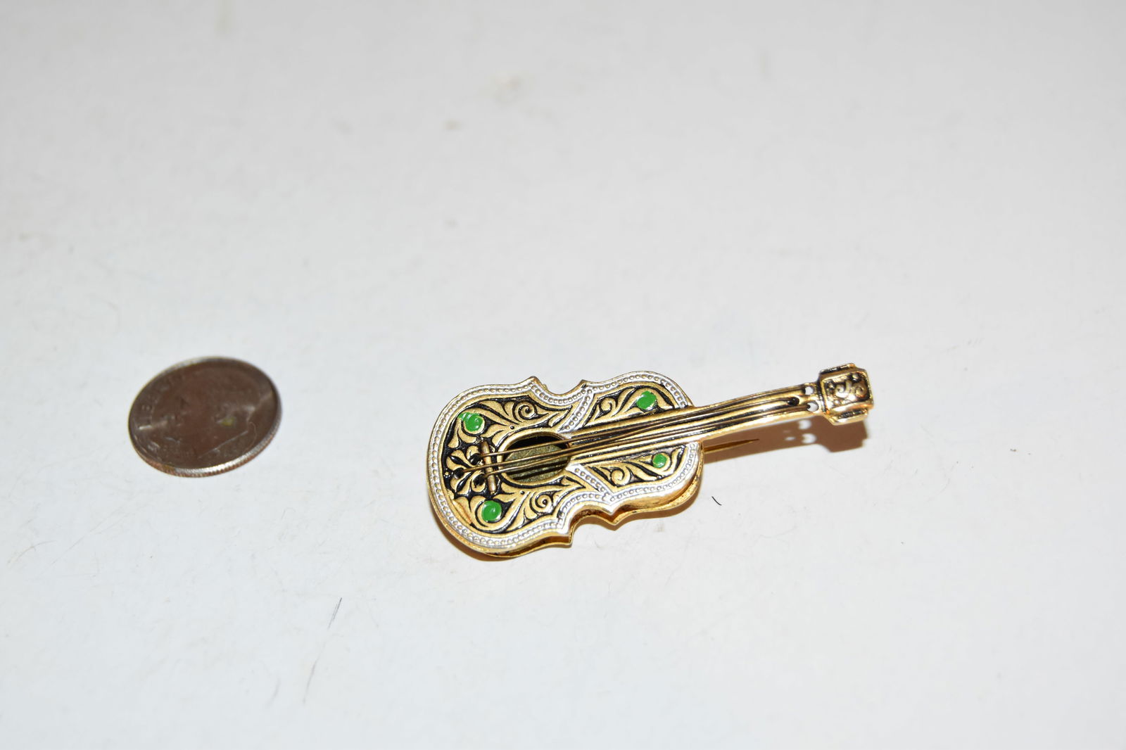 Vintage Damascene Guitar Spain Gold Tone 2": Vintage Damascene Guitar Spain Gold Tone 2" Please view all photos as they are part of the description and condition of this Item, Feel free to contact me with questions or picture requests! Used Item