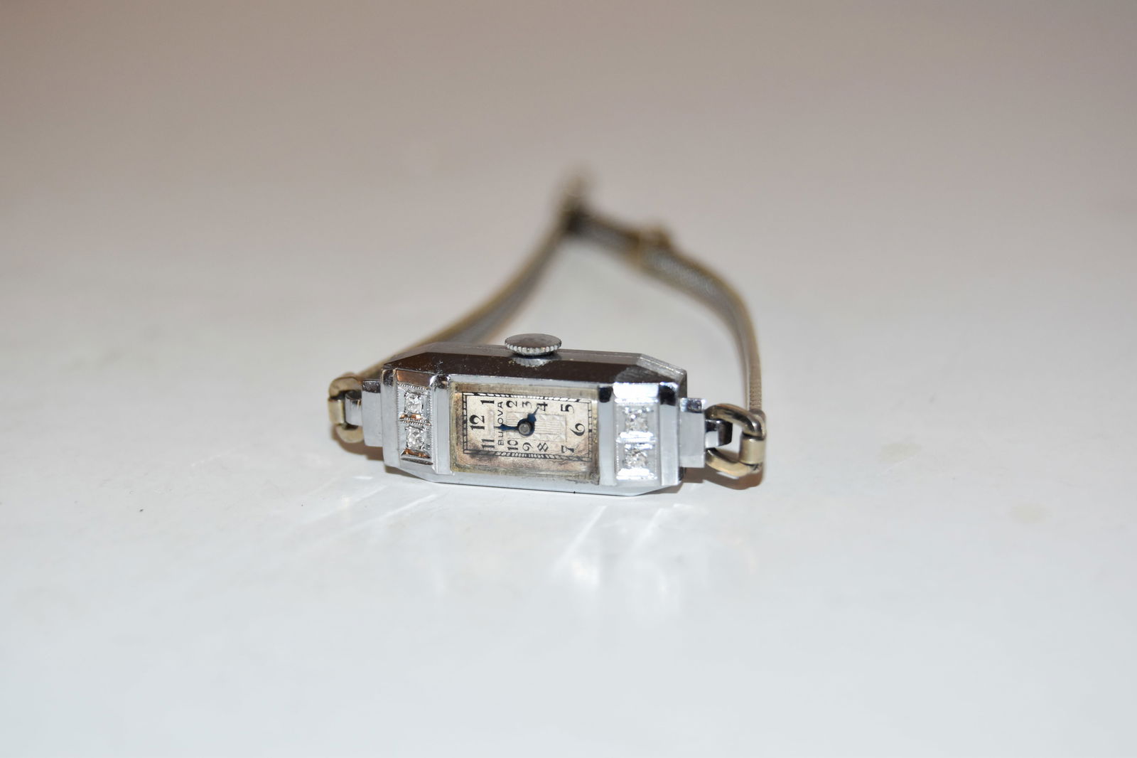 Bulova Ladies Watch 14k White Gold Diamonds 17 Jewels works missing the big hand band is goldfilled: Bulova Ladies Watch 14k White Gold Diamonds 17 Jewels works missing the big hand band is goldfilled Please view all photos as they are part of the description and condition of this Item, Feel free to