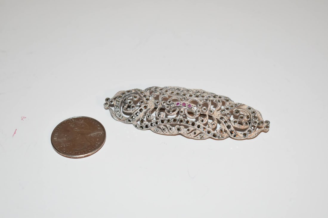 Vintage JJ sterling silver Marcasite brooch: Vintage JJ sterling silver Marcasite brooch Please view all photos as they are part of the description and condition of this Item, Feel free to contact me with questions or picture requests! Used Item