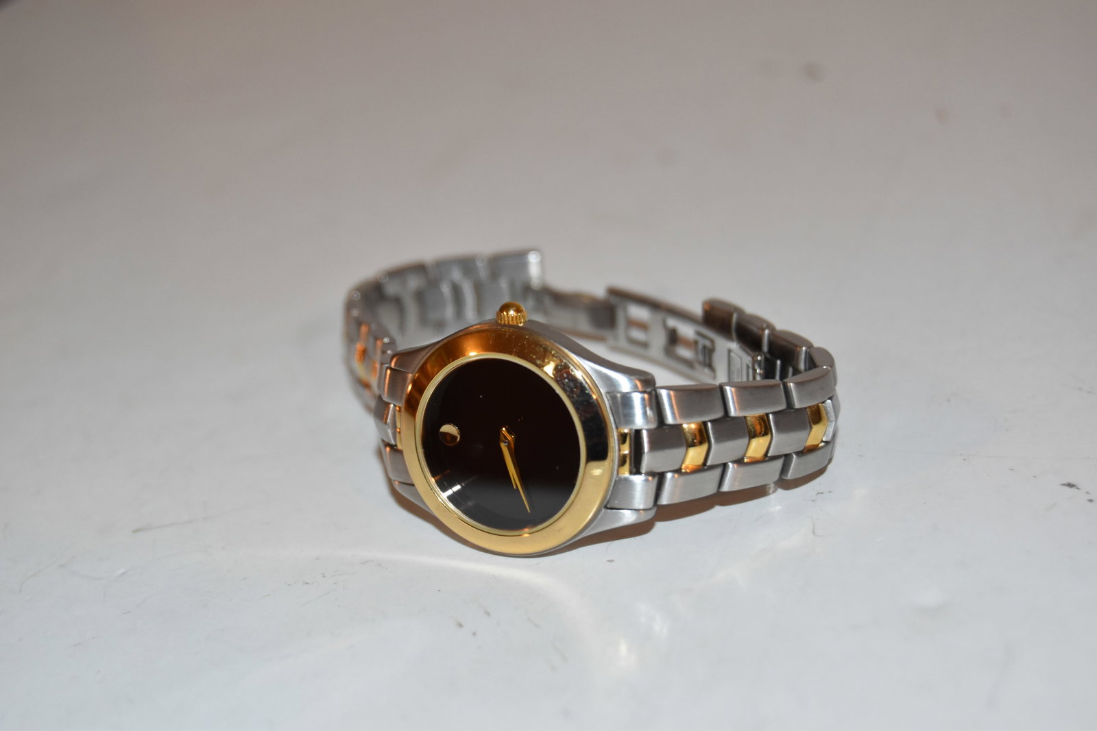 Movado Two Tone Stainless & Gold Plate Ladies Watch 1861 - Swiss Made works great!!!: Movado Two Tone Stainless & Gold Plate Ladies Watch 1861 - Swiss Made works great!!! Please view all photos as they are part of the description and condition of this Item, Feel free to contact me with