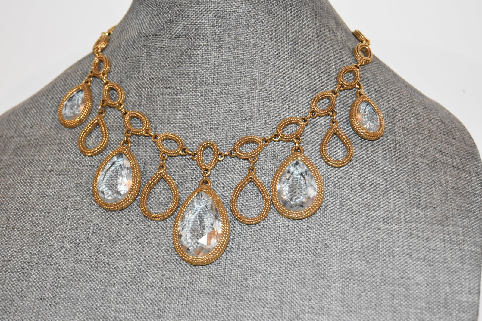Vintage Goldette Etruscan clear Teardrop Bezel Charm Statement Necklace: Vintage Goldette Etruscan clear Teardrop Bezel Charm Statement Necklace Please view all photos as they are part of the description and condition of this Item, Feel free to contact me with questions or