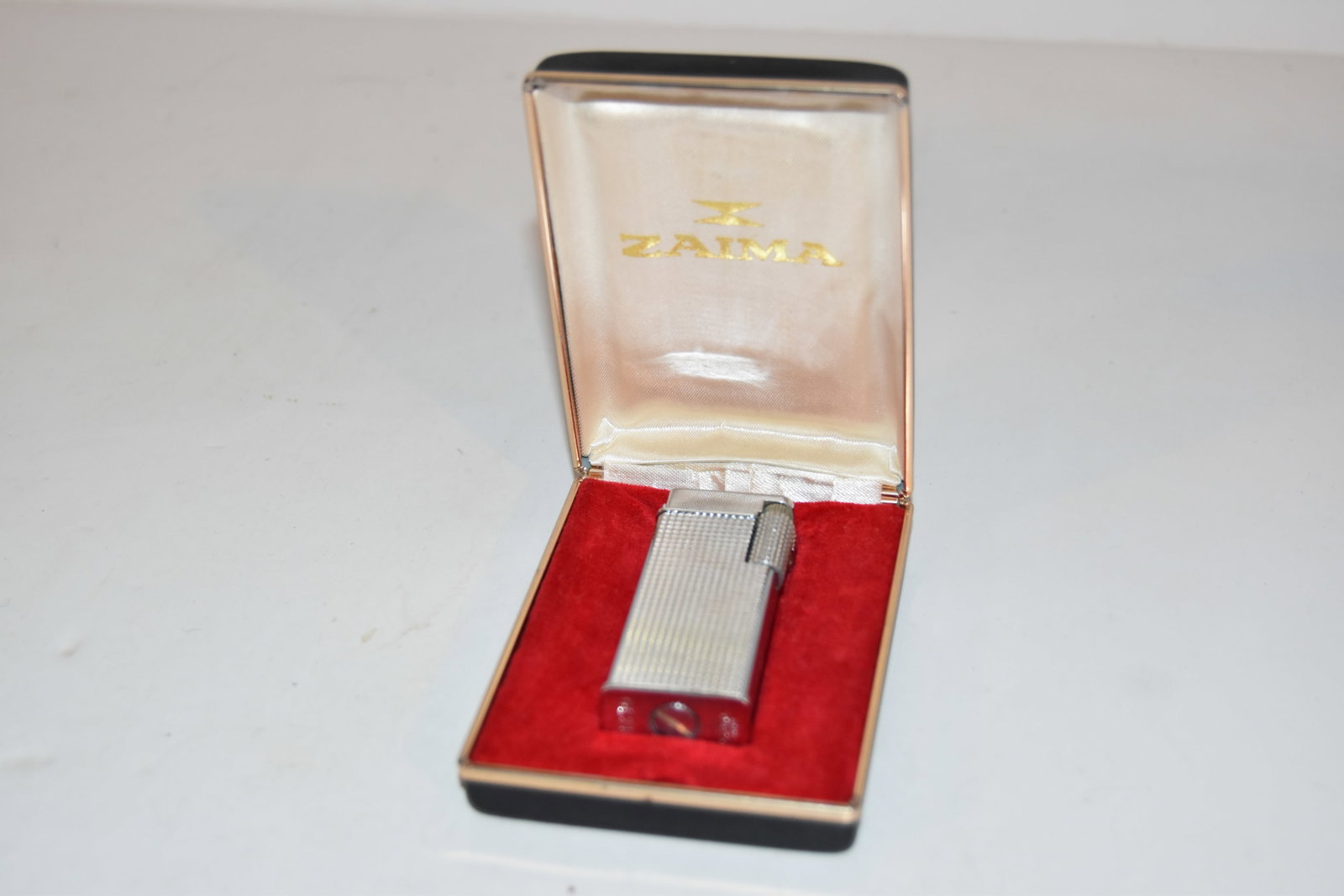 VINTAGE ZAIMA Cristo Lift Arm gas Lighter Japan Silver Tone NOS: VINTAGE ZAIMA Cristo Lift Arm gas Lighter Japan Silver Tone NOS Please view all photos as they are part of the description and condition of this Item, Feel free to contact me with questions or picture