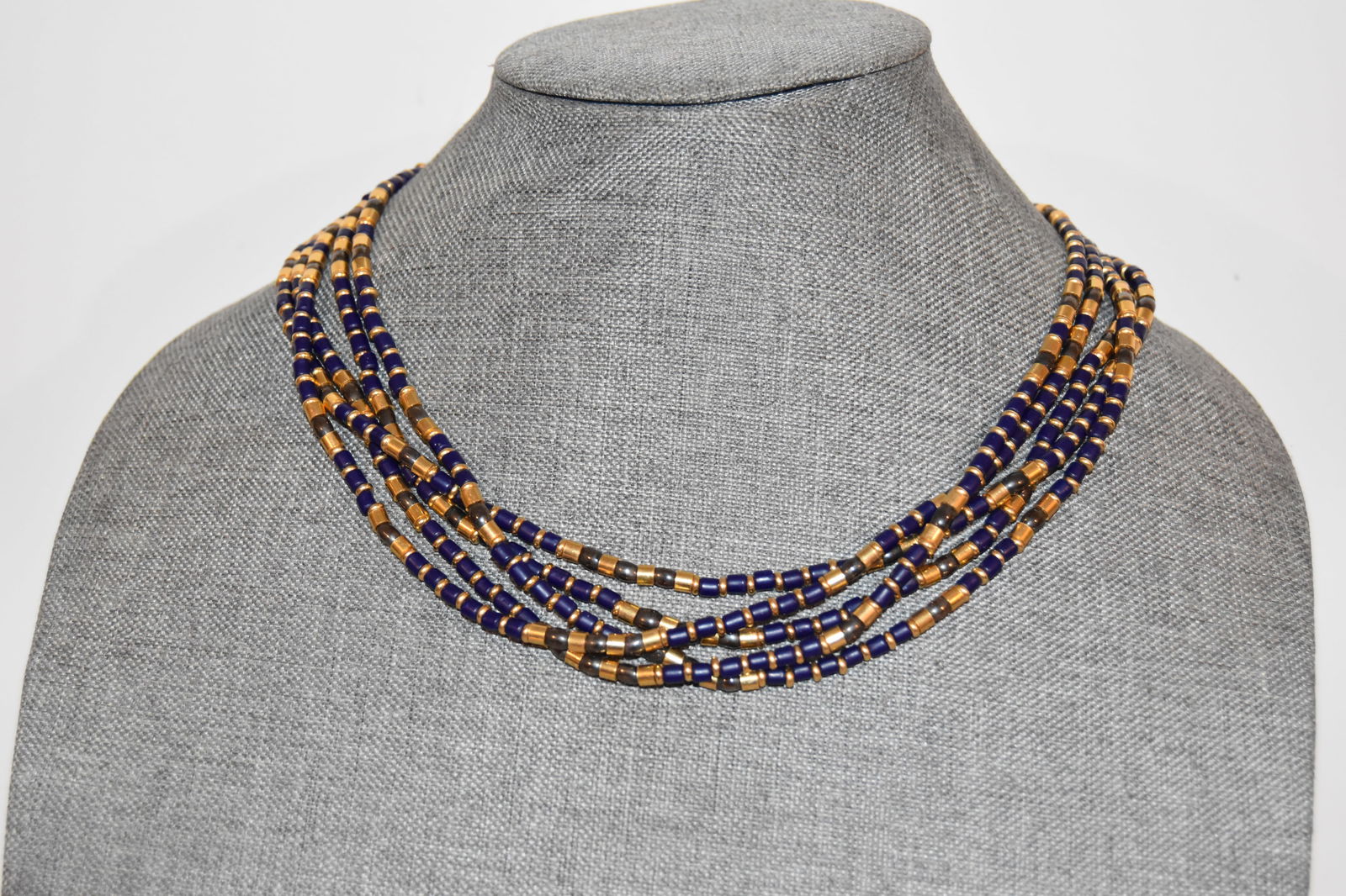 Vintage goldtone and black beaded 5 strand Necklace 19": Vintage goldtone and black beaded 5 strand Necklace 19" Please view all photos as they are part of the description and condition of this Item, Feel free to contact me with questions or picture request