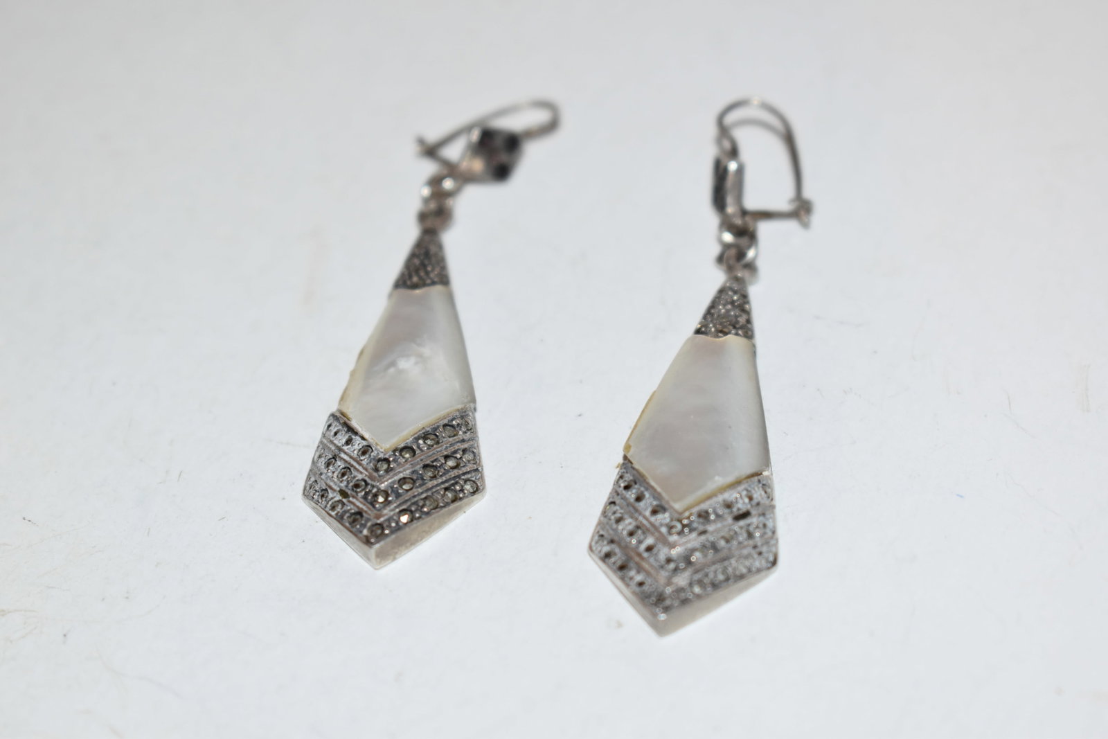 Vintage Sterling Silver mother of pearl marcasite Earrings: Vintage Sterling Silver mother of pearl marcasite Earrings Please view all photos as they are part of the description and condition of this Item, Feel free to contact me with questions or picture requ