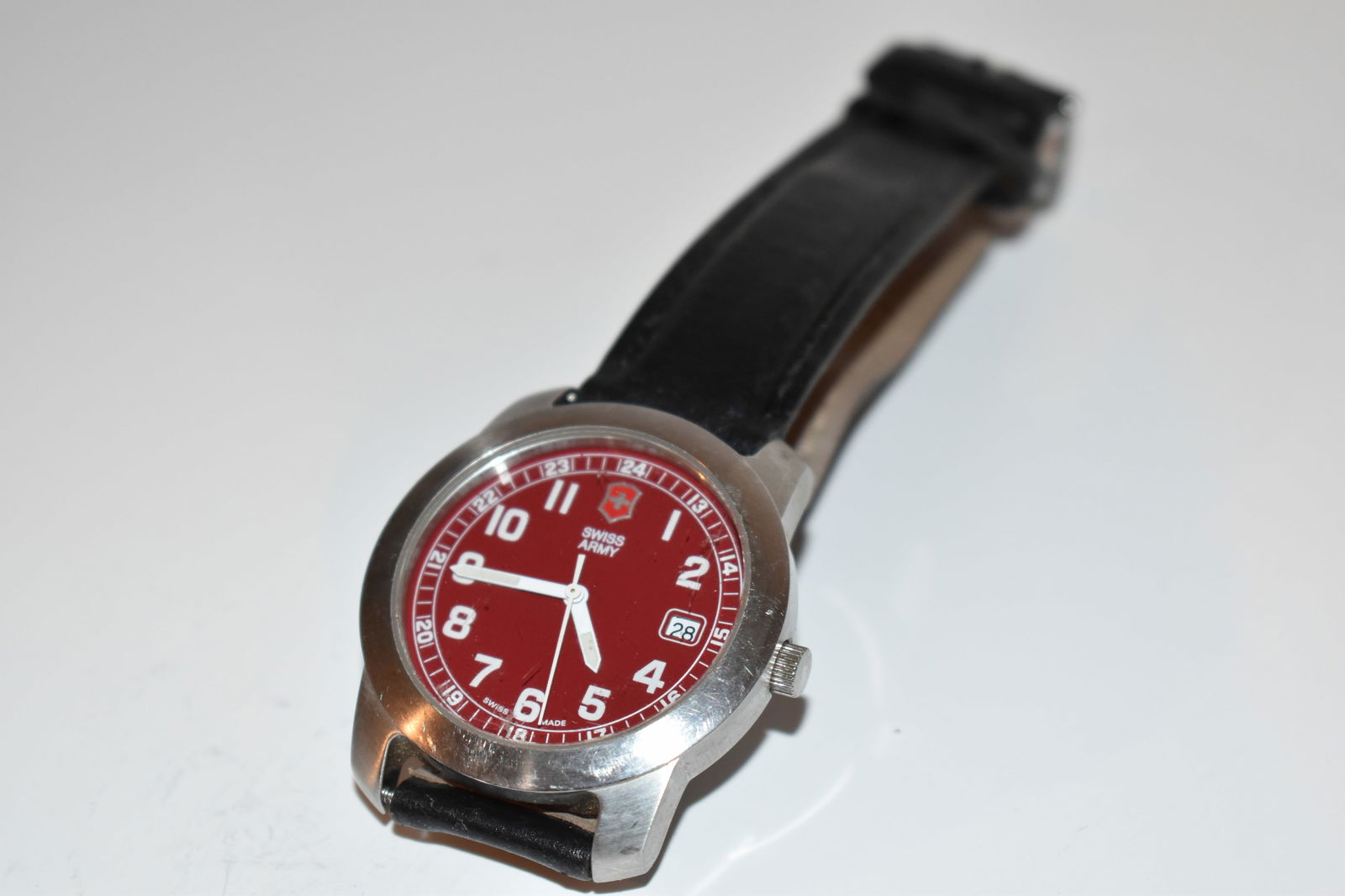 Swiss army top watch red face