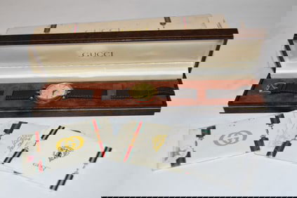 Vintage Gucci Men's Swiss Made Gold Ultra Thin Watch works great!!! Has small scratch on crystal