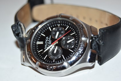 Nautica Men's Stainless Steel Quartz Watch works great needs band