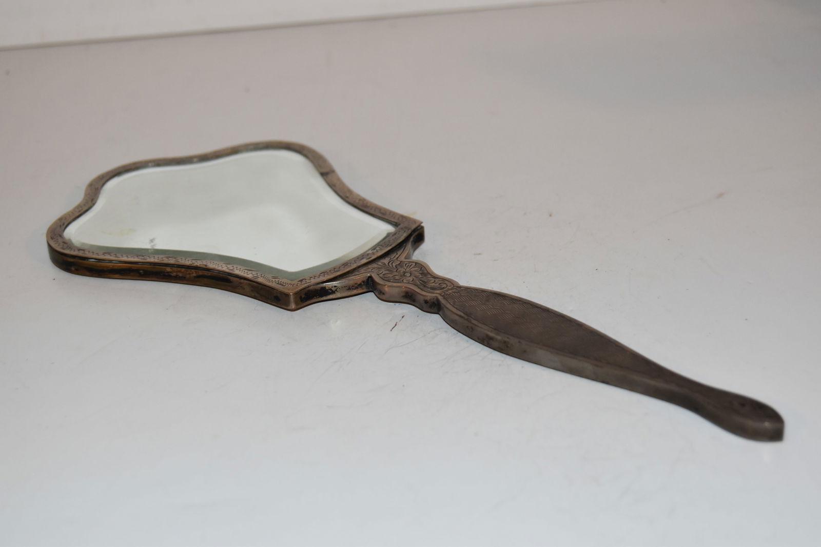 Vintage Sterling Silver Carved Hand Mirror: Vintage Sterling Silver Carved Hand Mirror Please view all photos as they are part of the description and condition of this Item, Feel free to contact me with questions or picture requests! Used Item