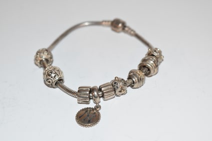 Authentic Pandora Sterling Silver Bracelet With 9 Charms 7.5"