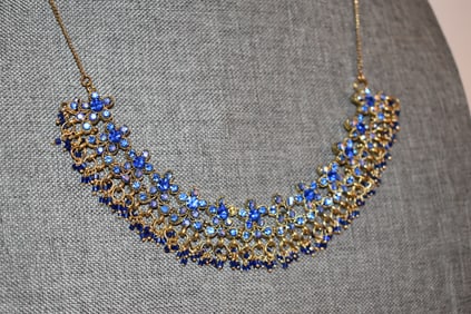 Vintage goldtone blue rhinestone Necklace 21" missing 1 stone