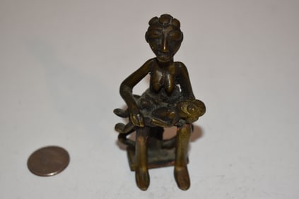 Vintage Cast Iron woman nursing child 3 1/2"