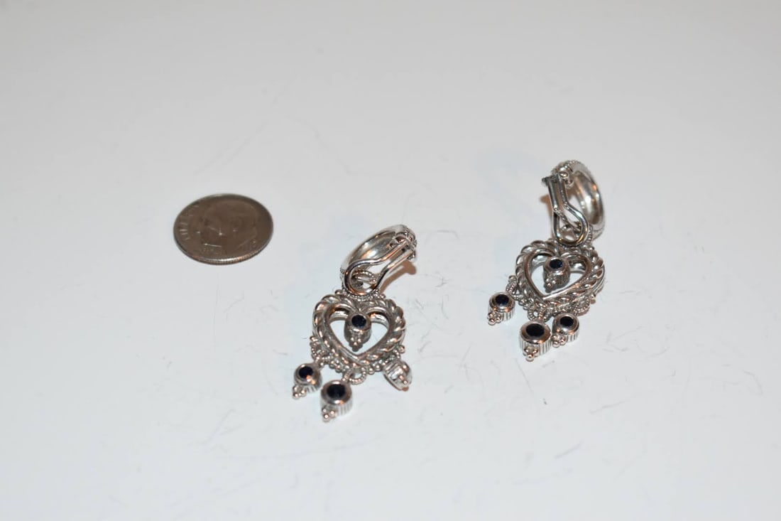 vintage sterling silver Judith Ripka earrings: vintage sterling silver Judith Ripka earrings Please view all photos as they are part of the description and condition of this Item, Feel free to contact me with questions or picture requests! Used It