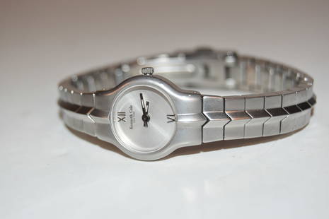 Kenneth Cole New York Silver Dial Women's Watch WORKS GREAT!!!: Kenneth Cole New York Silver Dial Women's Watch WORKS GREAT!!! Please view all photos as they are part of the description and condition of this Item, Feel free to contact me with questions or picture