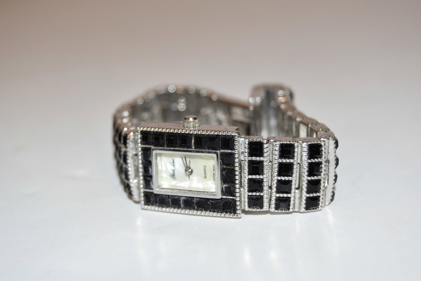 Ladies Park Lane Black Swarovski Accent Watch WORKS GREAT!!!: Ladies Park Lane Black Swarovski Accent Watch WORKS GREAT!!! Please view all photos as they are part of the description and condition of this Item, Feel free to contact me with questions or picture re
