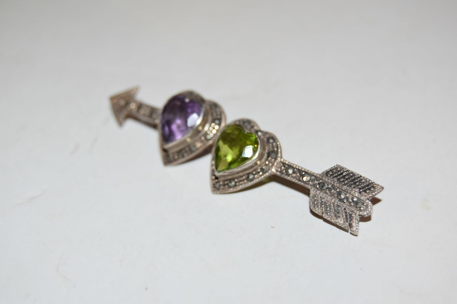 Vintage Sterling Silver heart & arrow marcasite Amethyst Brooch 1 5/8": Vintage Sterling Silver heart & arrow marcasite Amethyst Brooch 1 5/8" Please view all photos as they are part of the description and condition of this Item, Feel free to contact me with questions or 