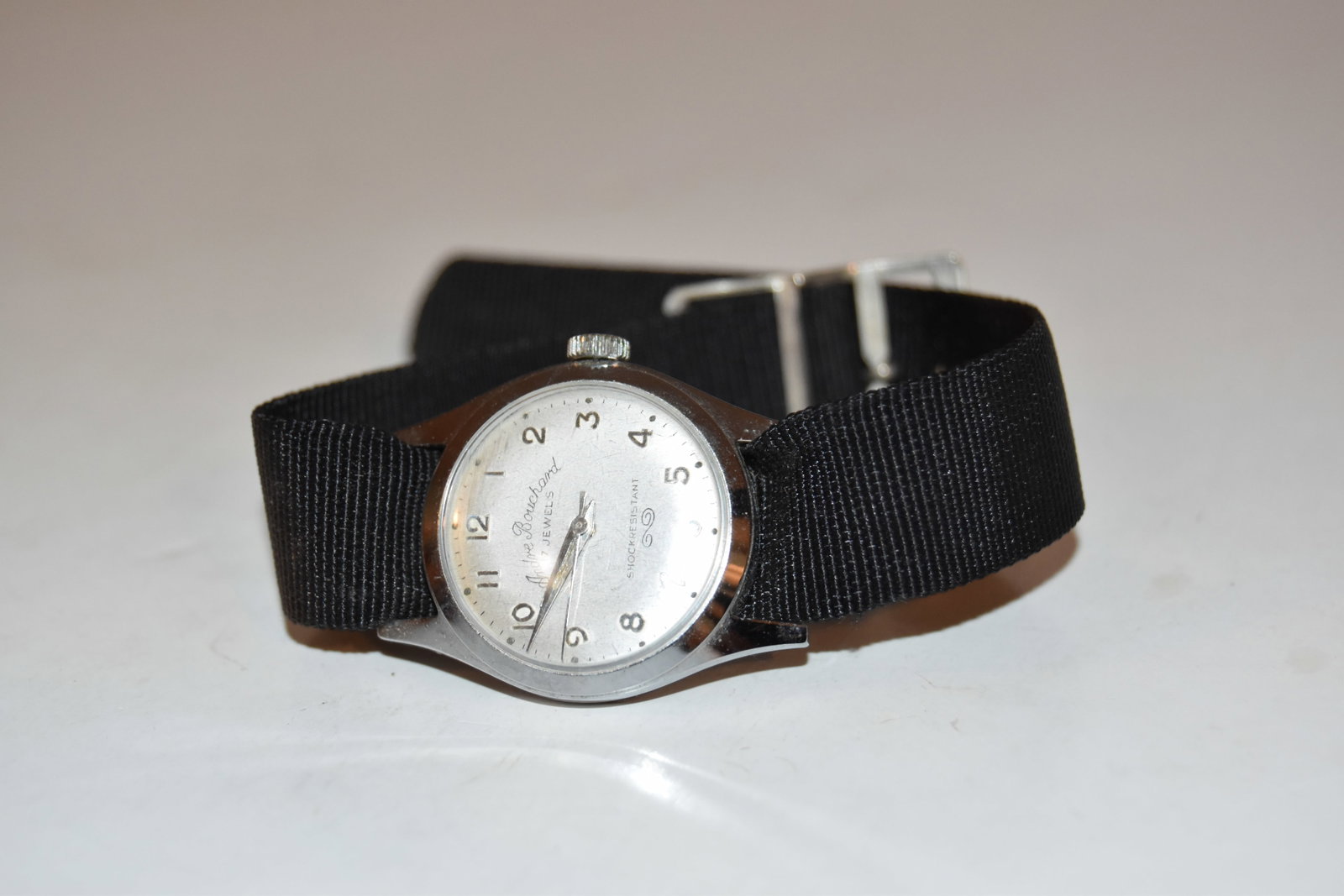 Vintage mens watch Andre Bouchard 17 Jewels Shock Resistant works great!!!: Vintage mens watch Andre Bouchard 17 Jewels Shock Resistant works great!!! Please view all photos as they are part of the description and condition of this Item, Feel free to contact me with questions