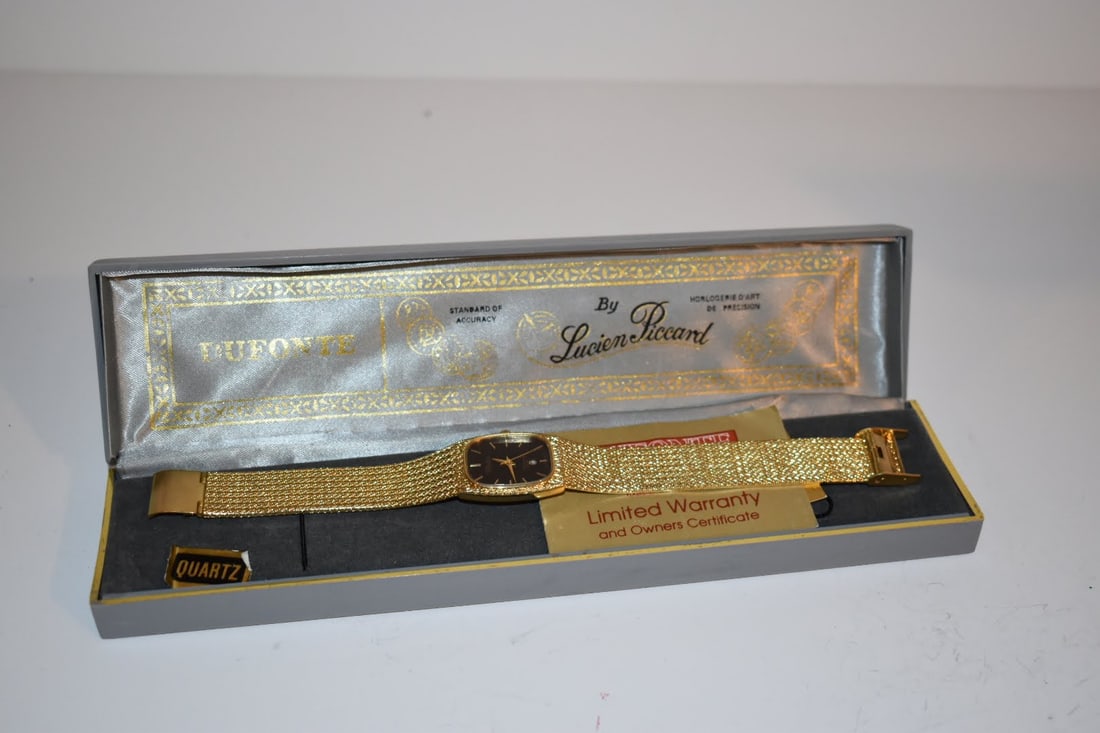 Vintage Lucien Piccard Dufonte goldtone Band with Diamond Watch new: Vintage Lucien Piccard Dufonte goldtone Band with Diamond Watch new Please view all photos as they are part of the description and condition of this Item, Feel free to contact me with questions or pic