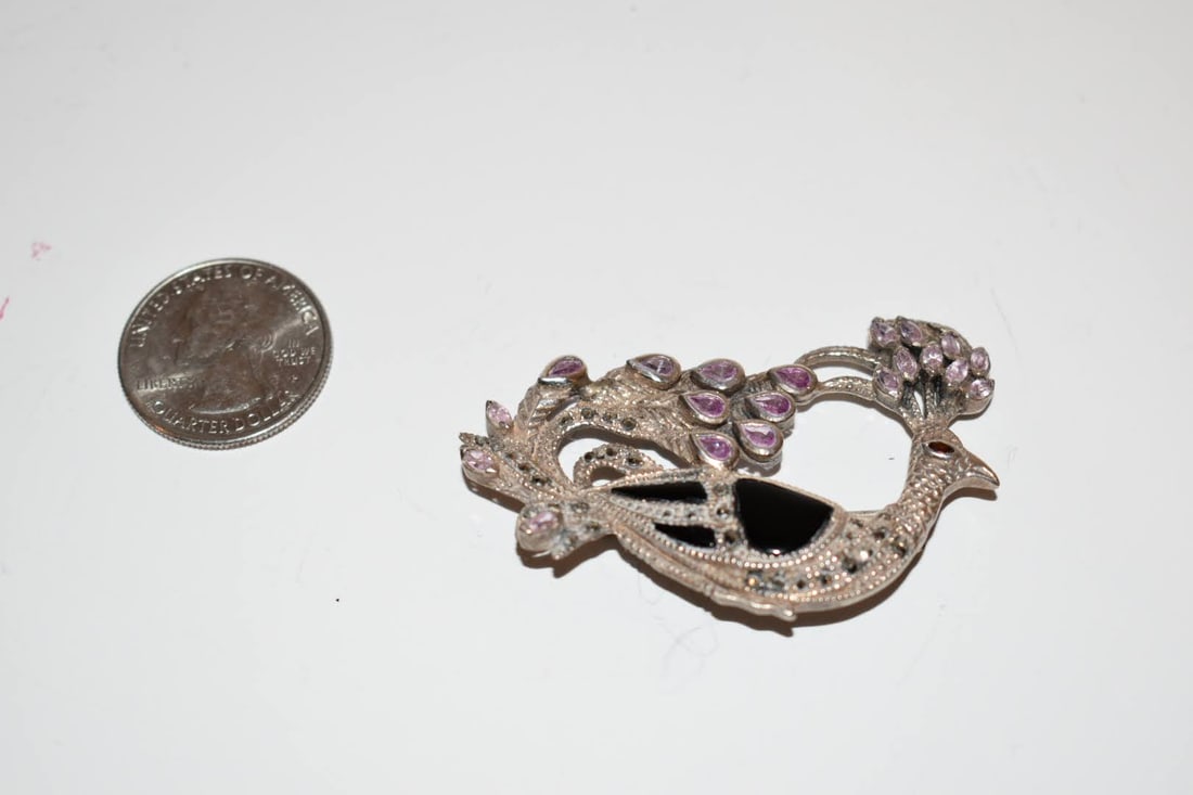 Vintage sterling silver peacock marcasite onyx ruby brooch: Vintage sterling silver peacock marcasite onyx ruby brooch Please view all photos as they are part of the description and condition of this Item, Feel free to contact me with questions or picture requ