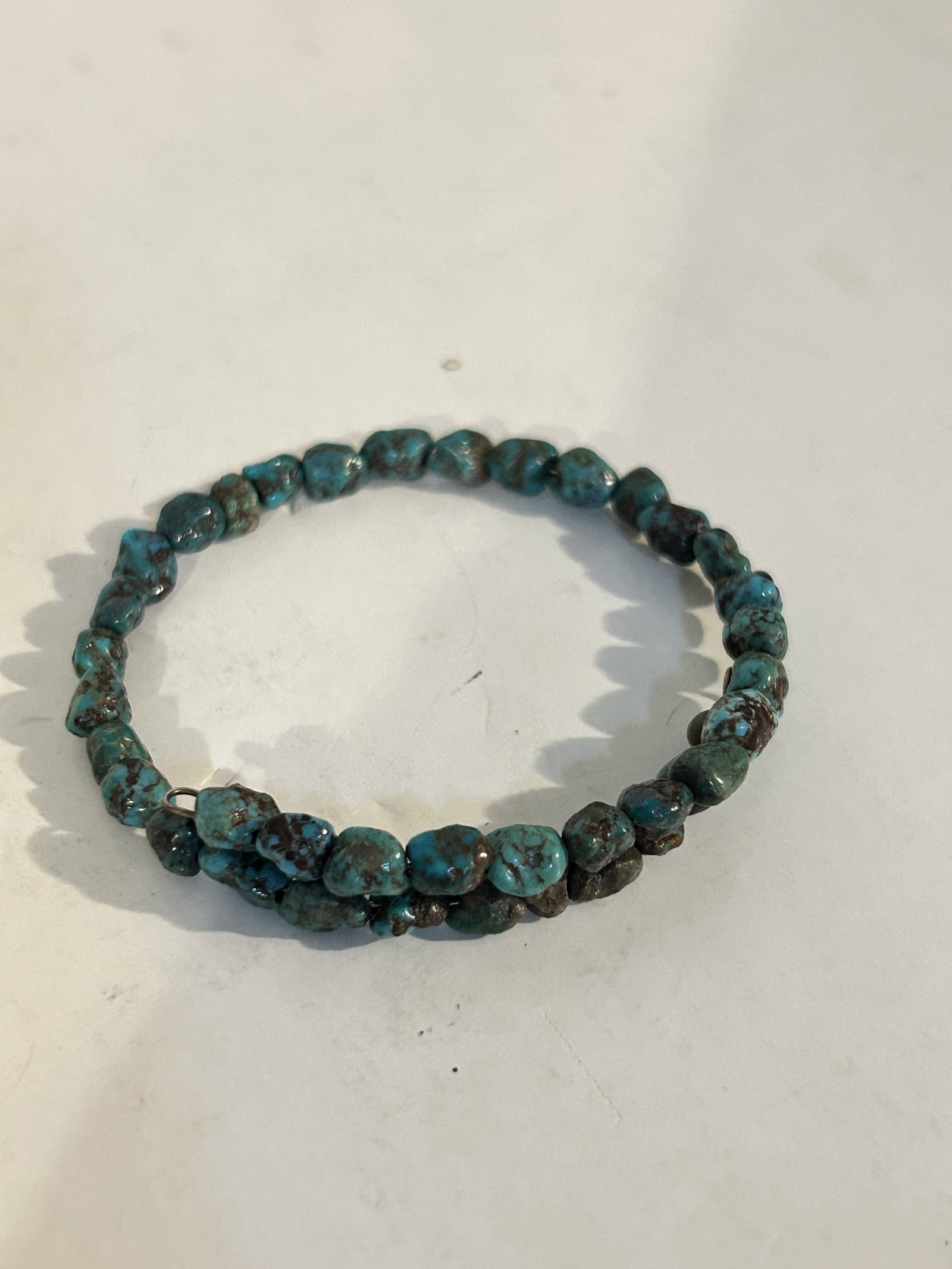 Vintage Turquoise stretch beaded Bracelet: Vintage Turquoise stretch beaded Bracelet Please view all photos as they are part of the description and condition of this Item, Feel free to contact me with questions or picture requests! Used Item A