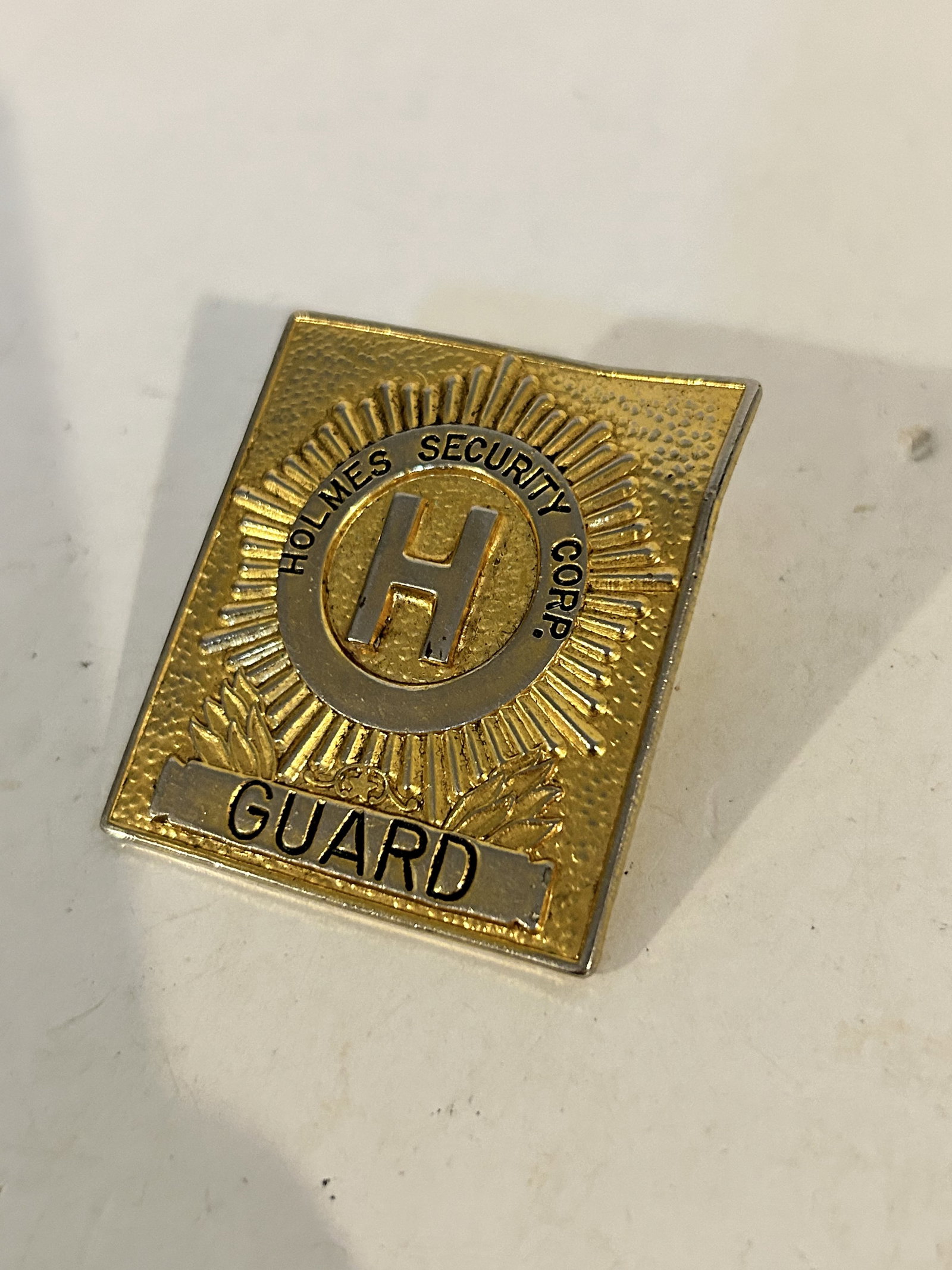 Vintage Holmes Security Guard Badge/Pin: Vintage Holmes Security Guard Badge/Pin Please view all photos as they are part of the description and condition of this Item, Feel free to contact me with questions or picture requests! Used Item AS 