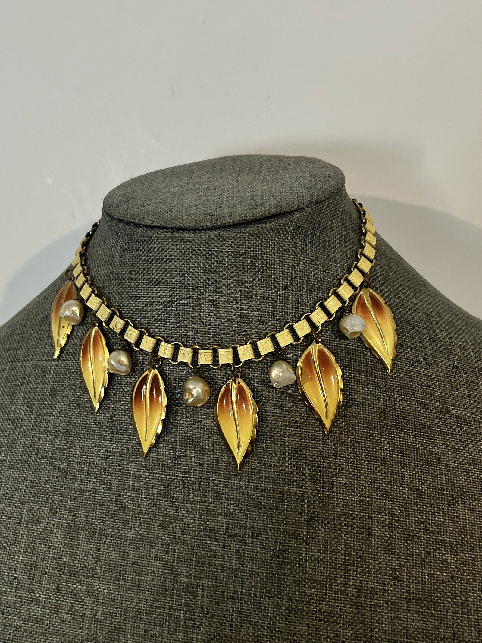 Vintage old brass enamel leave pearl choker Necklace: Vintage old brass enamel leave pearl choker Necklace Please view all photos as they are part of the description and condition of this Item, Feel free to contact me with questions or picture requests! 