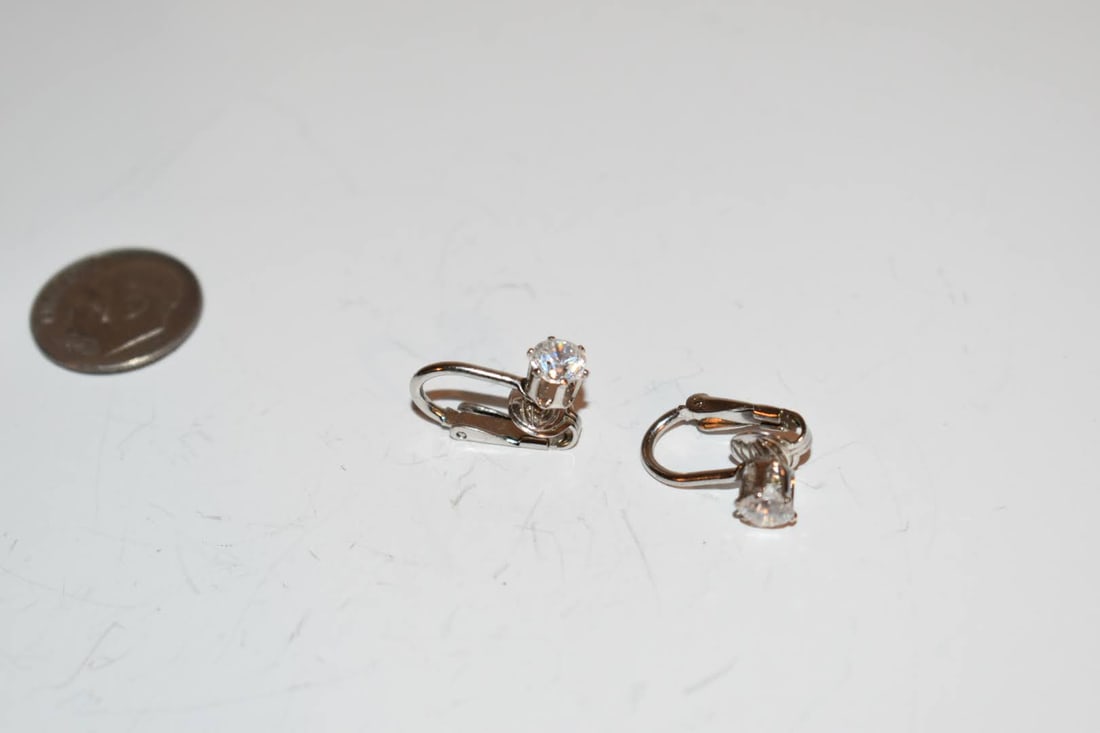 vintage sterling silver rhinestone clip on earrings: vintage sterling silver rhinestone clip on earrings Please view all photos as they are part of the description and condition of this Item, Feel free to contact me with questions or picture requests! U