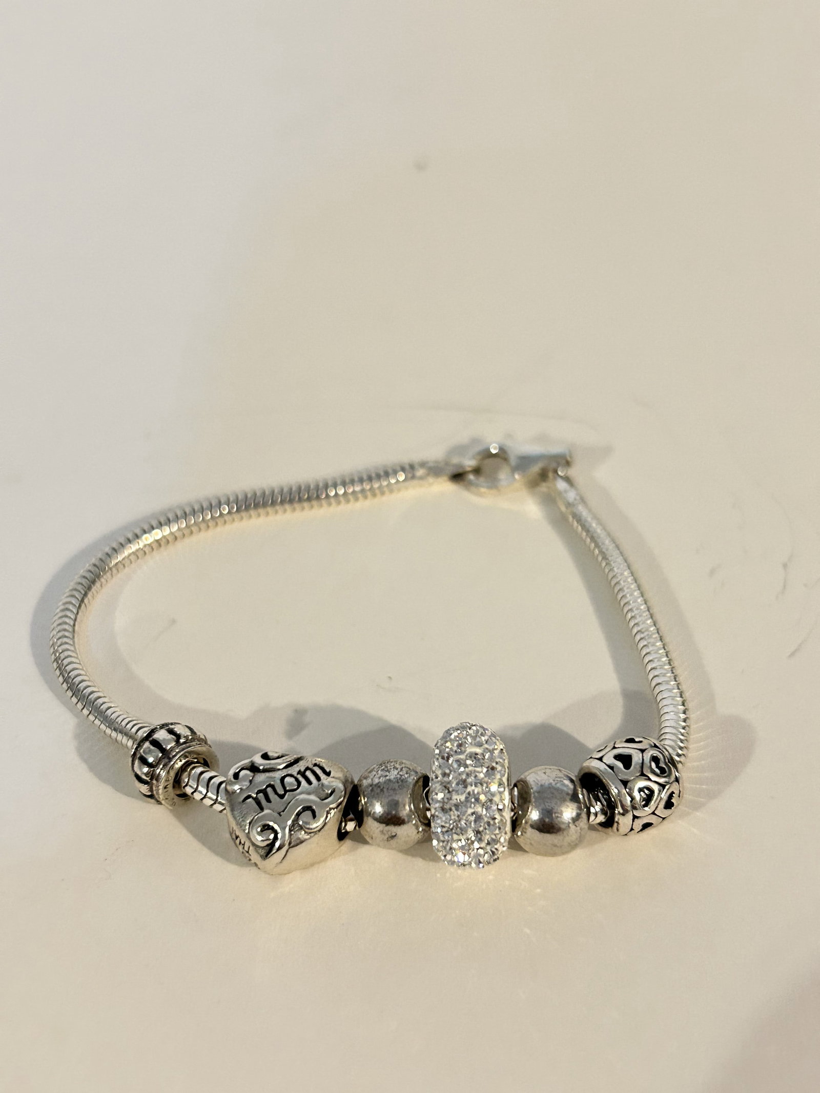 Vintage Sterling Silver pandora style Bracelet 7.5": Vintage Sterling Silver pandora style Bracelet 7.5" Please view all photos as they are part of the description and condition of this Item, Feel free to contact me with questions or picture requests! U