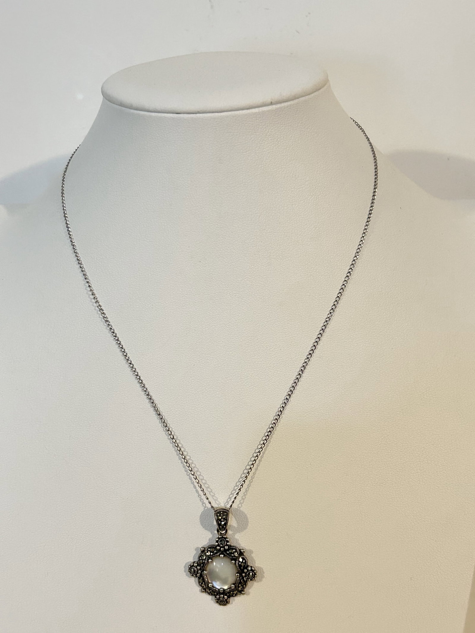Vintage Sterling Silver mother of pearl marcasite pendant Necklace 17": Vintage Sterling Silver mother of pearl marcasite pendant Necklace 17" Please view all photos as they are part of the description and condition of this Item, Feel free to contact me with questions or 
